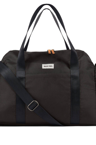 Black duffel bag with a strap on a white background